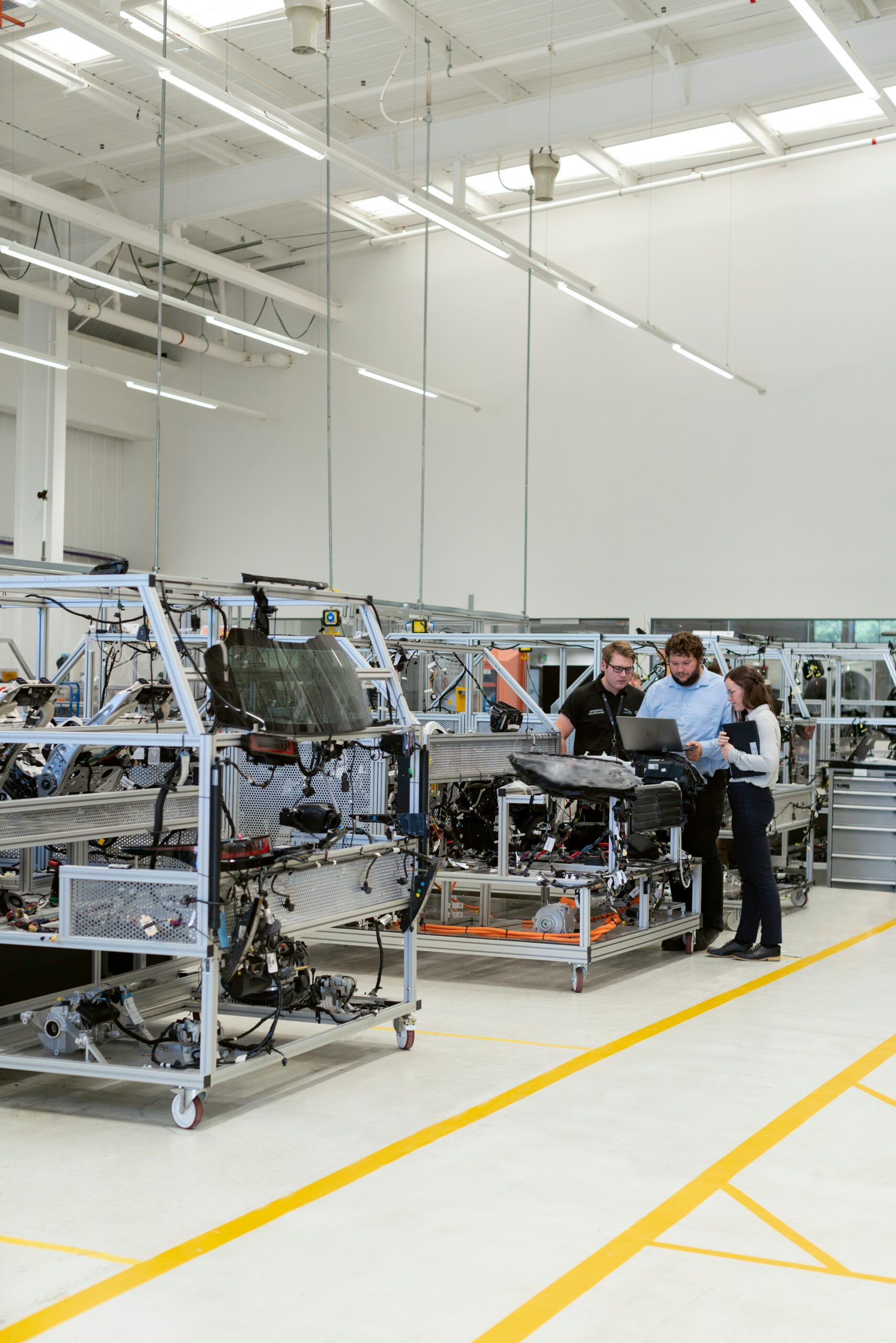 Optium team reviewing a production line configuration